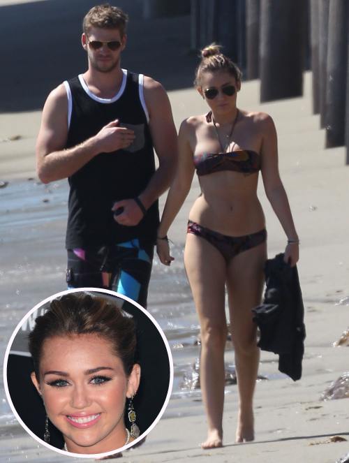 Miley Cyrus cu colacei pe talie