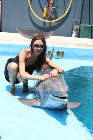 Foto: Victoria Beckham poate să zâmbească!