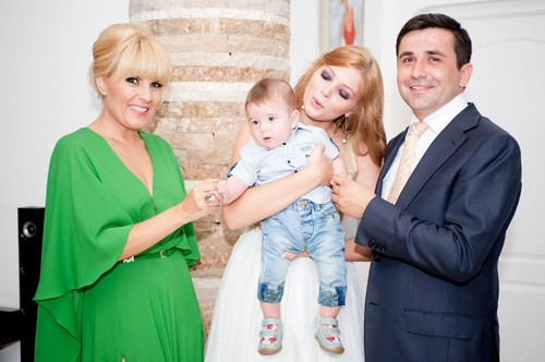Elena Udrea, înnebunită după copii. A devenit naşă de botez pentru a cincea oară! Foto